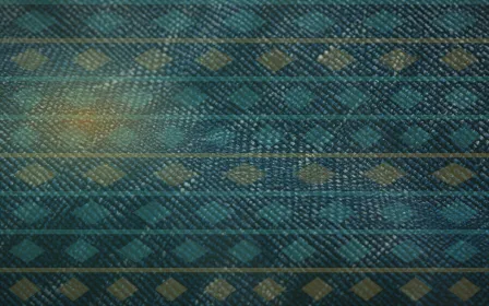 Kente Afterglow — colourful gold and teal strip-weave background