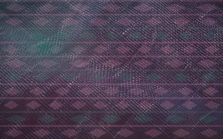 Kente Rim Light — colourful teal and pink strip-weave background