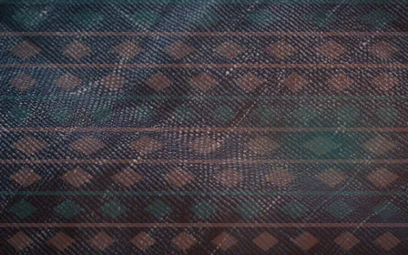 Kente Window Light — colourful teal, red and orange strip-weave background
