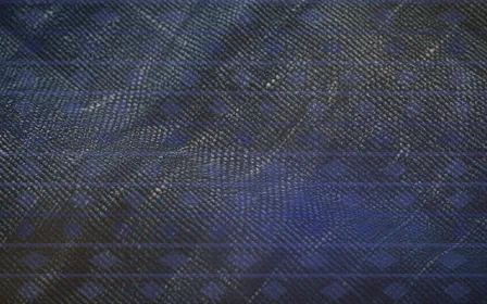 Kilim Gallery Light — colourful blue and gold kilim background