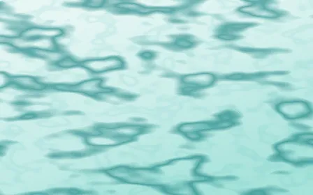 Cancún Surf Veined Marble — light teal marble background
