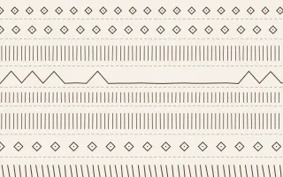 Manila Shell Ecru Mudcloth — light white and brown mudcloth background