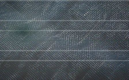 Mudcloth Afterglow — dark green and white mudcloth background
