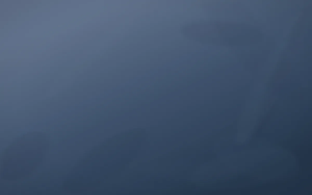 Blue Hour Plaster — dark blue plaster wall background