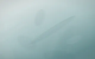 Coastal Mist Plaster — light white and teal plaster wall background