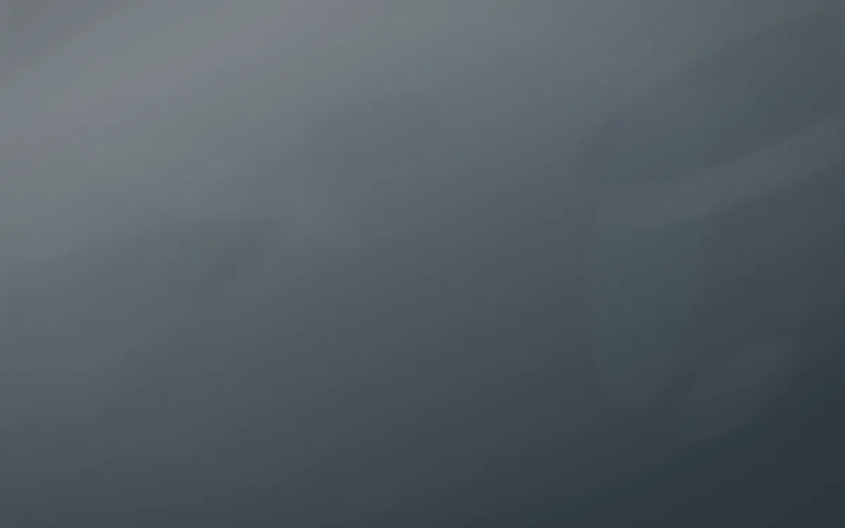 Storm Light Plaster — dark grey and blue plaster wall background