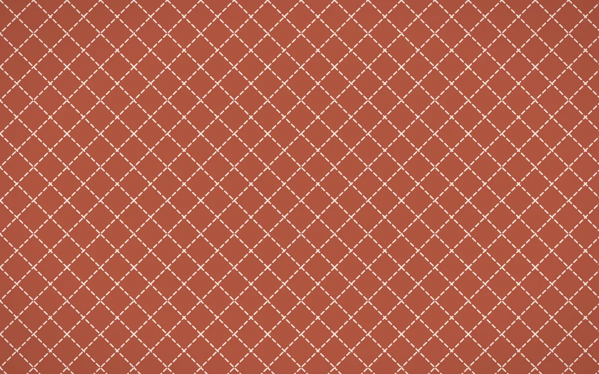 Jaipur Rose Stitch Diamonds — colourful red and orange sashiko background