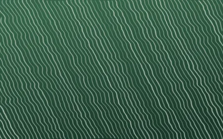Alhambra Jade Arashi Shibori — dark green and white shibori background