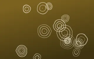 Cairo Gold Shibori Rings — dark brown and beige shibori background