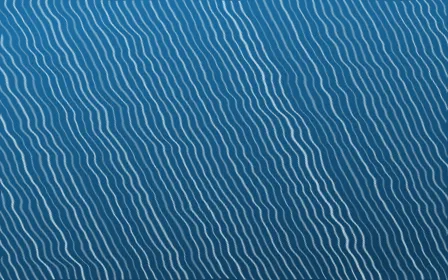 Capri Blue Arashi Shibori — dark blue and white shibori background