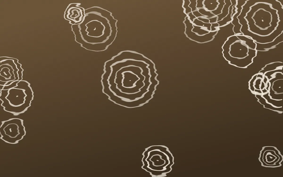 Desert Oud Shibori Rings — dark brown and beige shibori background