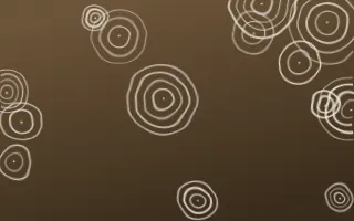 Desert Oud Shibori Rings — dark brown and beige shibori background