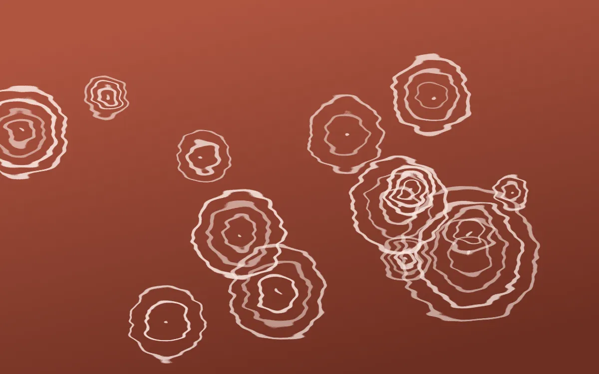 Jaipur Rose Shibori Rings — dark red, brown and orange shibori background