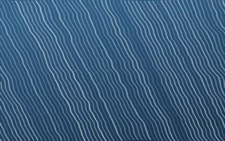Lisbon Azul Arashi Shibori — dark blue and white shibori background