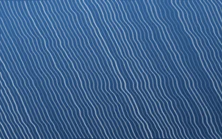 Ming Porcelain Arashi Shibori — dark blue and white shibori background