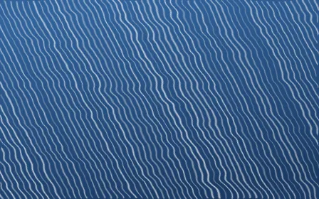 Ming Porcelain Arashi Shibori — dark blue and white shibori background