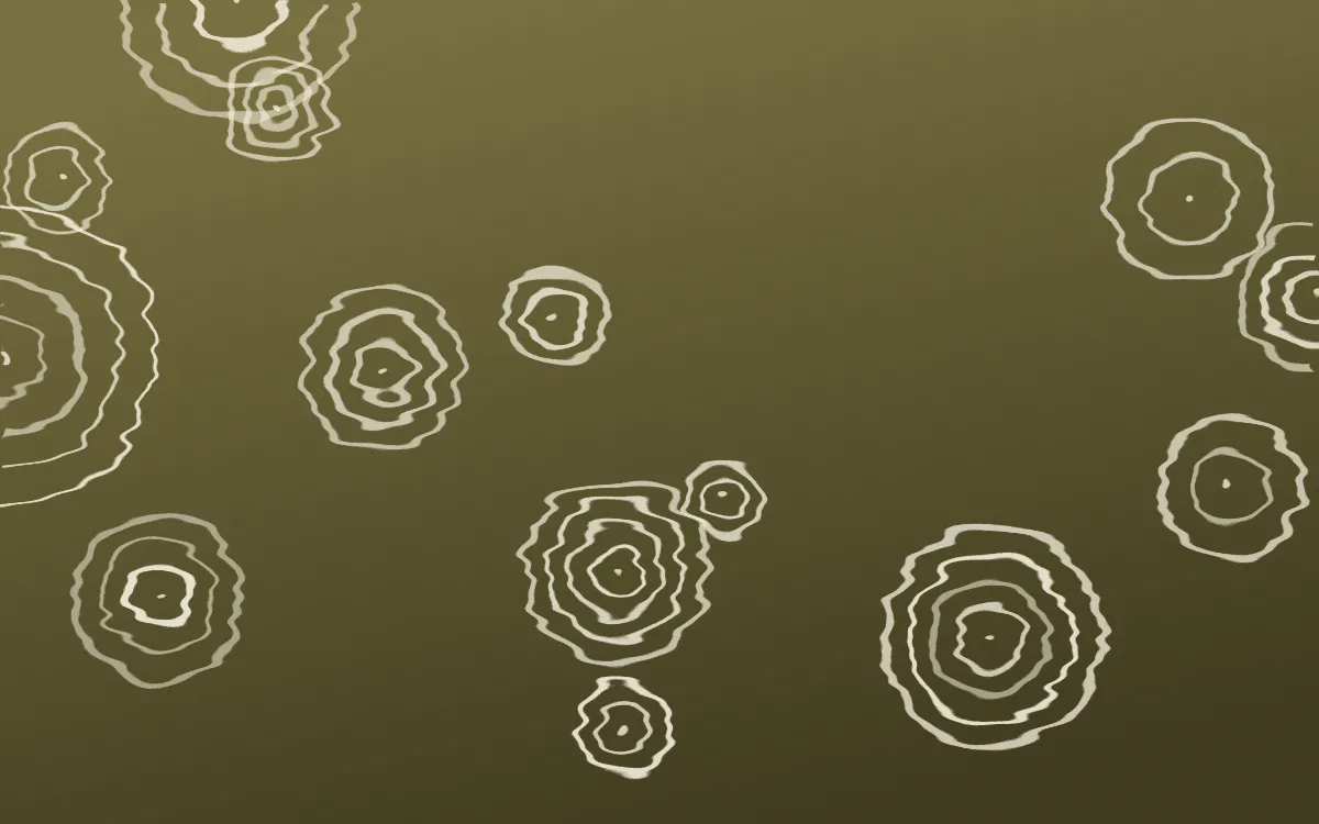 Nile Papyrus Shibori Rings — dark yellow and beige shibori background