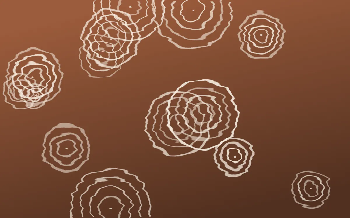 Santa Fe Adobe Shibori Rings — dark orange, brown and beige shibori background
