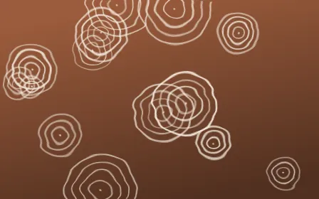 Santa Fe Adobe Shibori Rings — dark orange, brown and beige shibori background