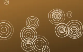 Tuscany Sun Shibori Rings — dark brown and beige shibori background