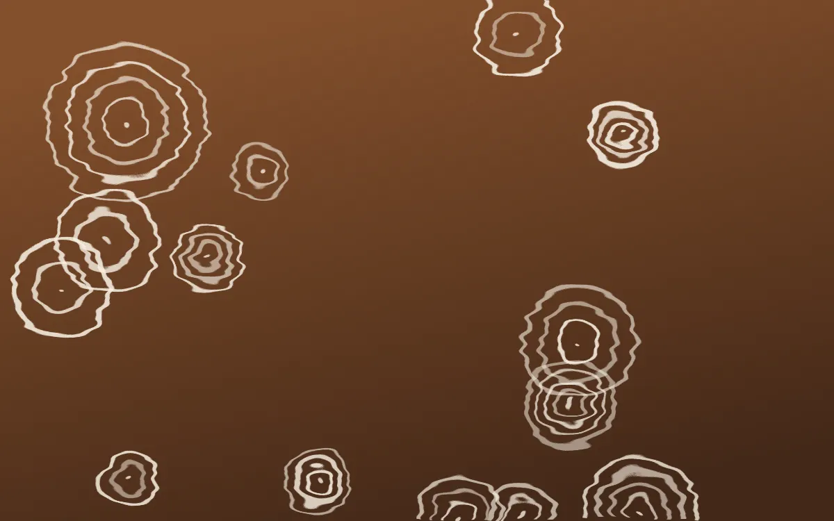 Zanzibar Spice Shibori Rings — dark brown and beige shibori background