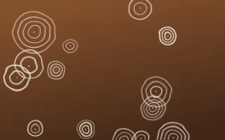 Zanzibar Spice Shibori Rings — dark brown and beige shibori background