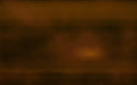 Gold Dust Nebula — dark black, orange and brown space background