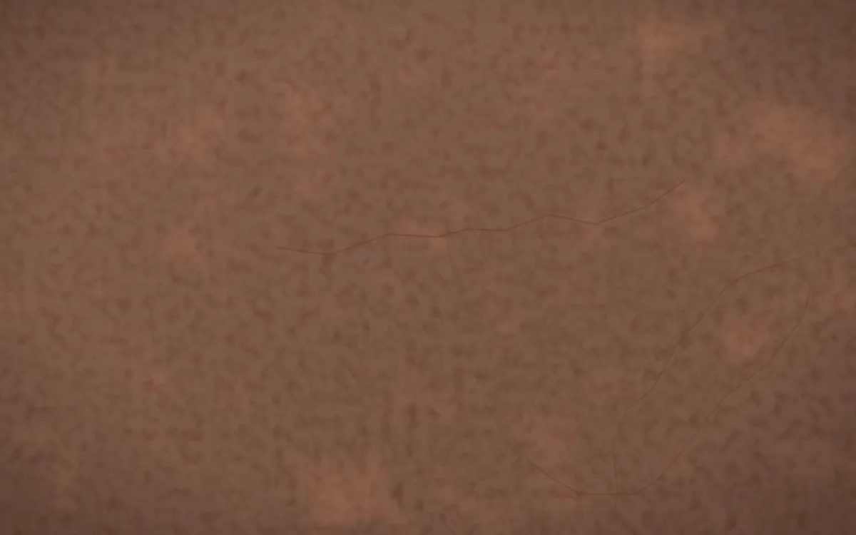 Kerala Laterite — dark orange and brown stone background