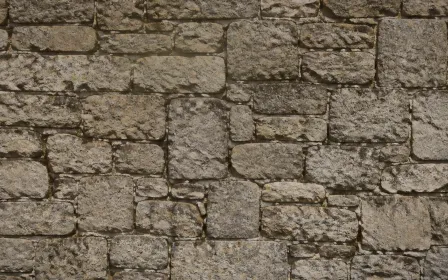 Stonewall Dusk Glow — dark yellow, brown and grey stone wall background