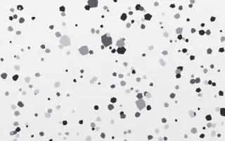 Mono Ink Terrazzo Fine II — light grey and white terrazzo background, variation II