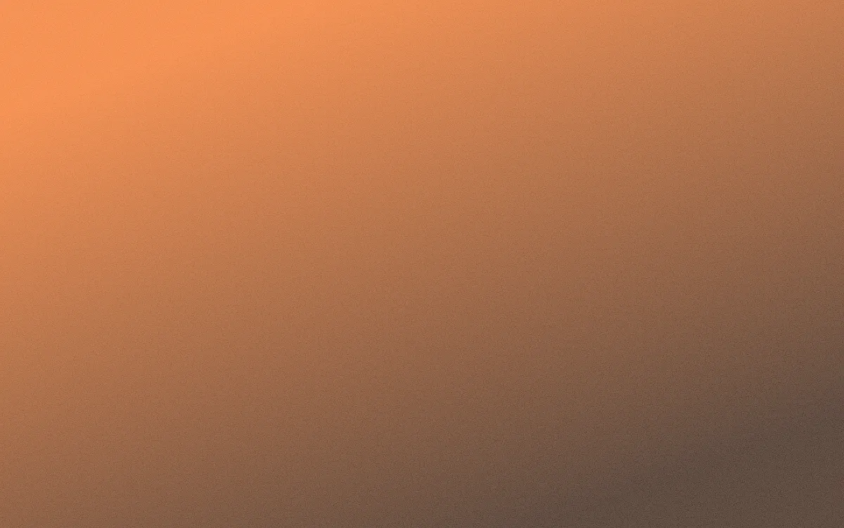 Clementine Grain — dark orange and black textured background