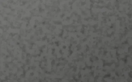 Edo Charcoal Plaster — dark grey textured background
