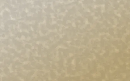 Kerala Spice Plaster — light beige and yellow textured background