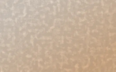 Sahara Dusk Plaster — light beige and orange textured background