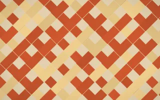 Lagos Wax Herringbone Tiles — colourful yellow, orange and beige tile background